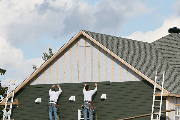 Professional Siding Replacement technician working in Point Harbor, NC